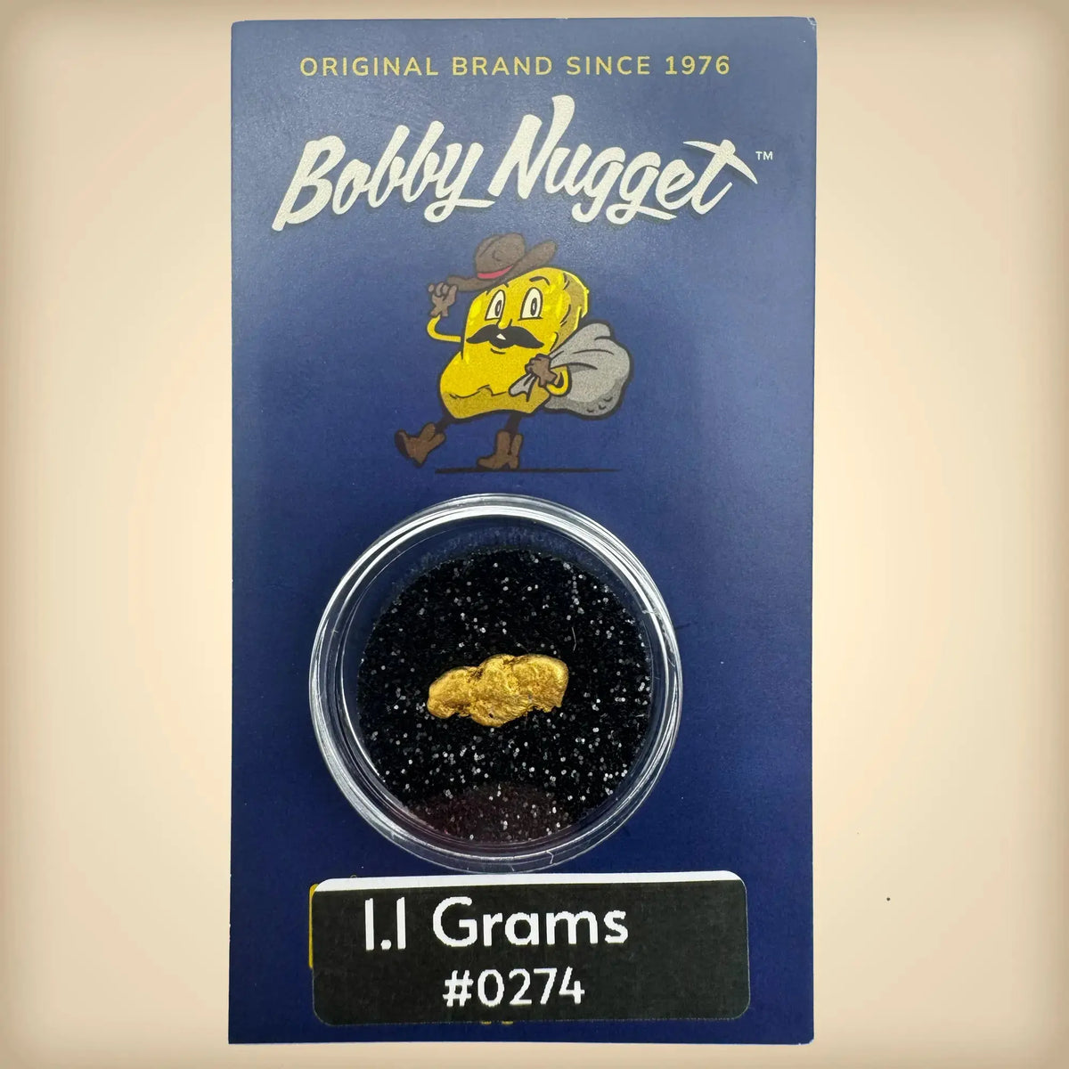 Bobby Nugget packaging with a gold nugget and brand logo on a beige background