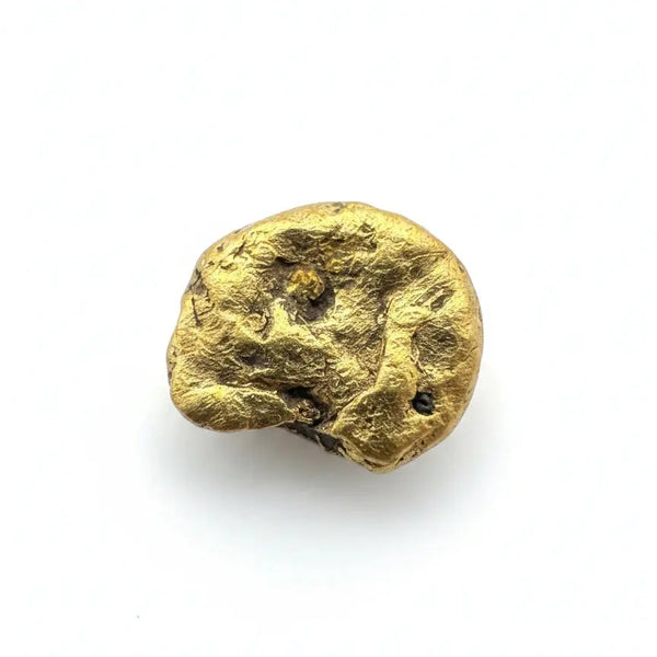 Rough California gold nugget glistening with natural rugged charm on a white background  