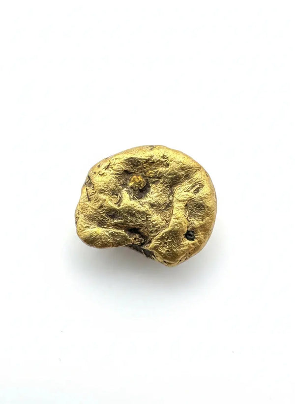 Rough California gold nugget glistening with natural rugged charm on a white background  